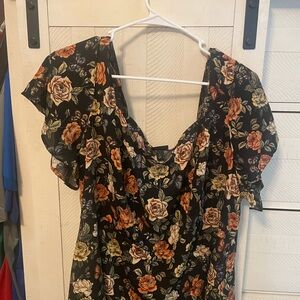 Torrid Black Peplum Top with Orange Floral Pattern